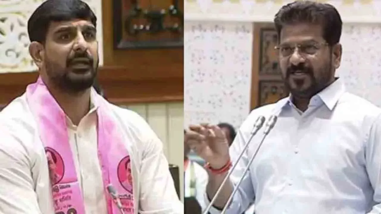 विधानसभा में हंगामे के दौरान विधायक आपस में बहस करते हुए