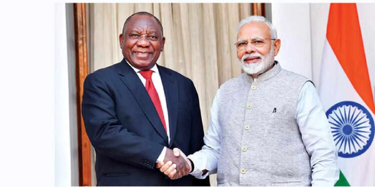 कार्यक्रम में बोलते दक्षिण अफ्रीका के मंत्री