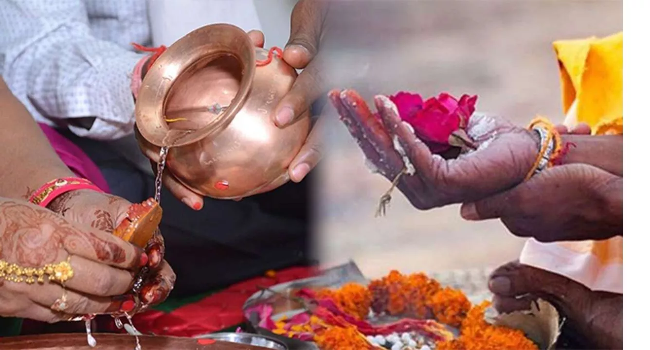 अमावस्या पर पितरों को तर्पण करते श्रद्धालु